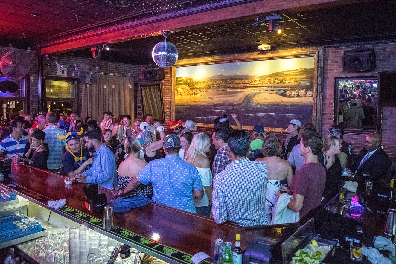 Interior, bar area, guests having fun